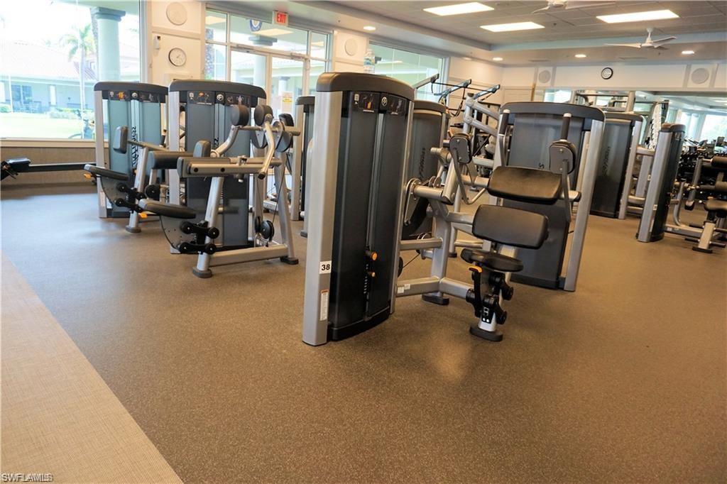 4194 St George Lane Naples, FL 34119 - Photo 25 of 29 a view of a room with gym equipment