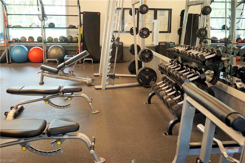 4194 St George Lane Naples, FL 34119 - Photo 26 of 29 a room with gym equipment