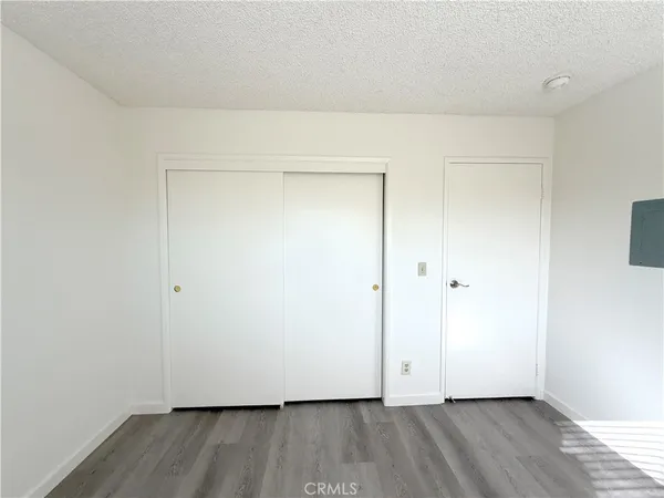 a view of small space with wooden floor