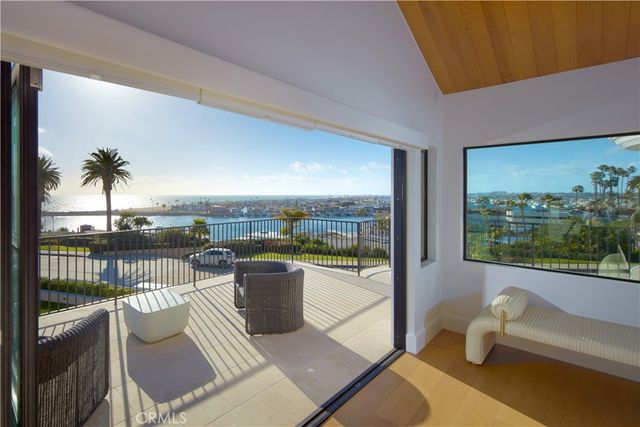 a view of a balcony with furniture