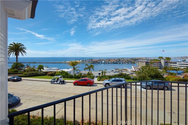 a view of a lake with a yard and mountain view