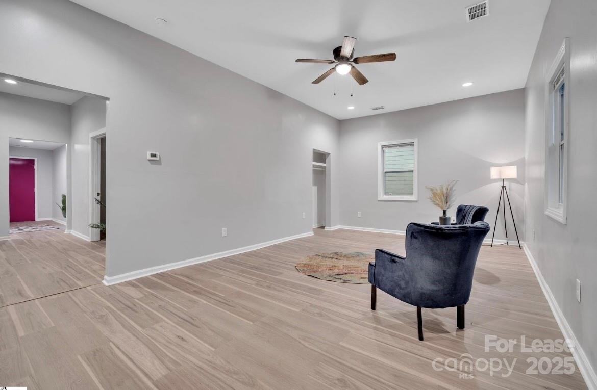 426 Arch Street Spartanburg, SC 29301 - Photo 2 of 13 a view of a livingroom with furniture and wooden floor