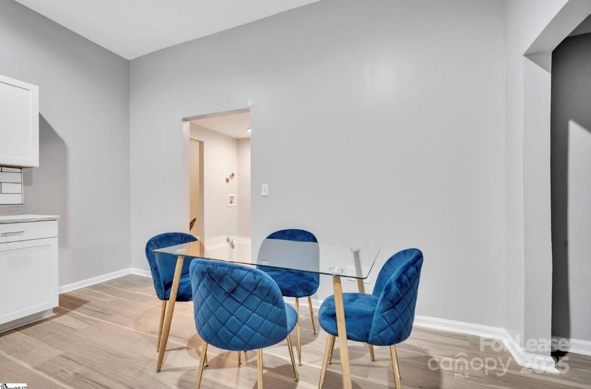 426 Arch Street Spartanburg, SC 29301 - Photo 4 of 13 a living room with furniture and a window