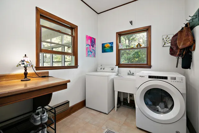 a workspace with furniture and a window