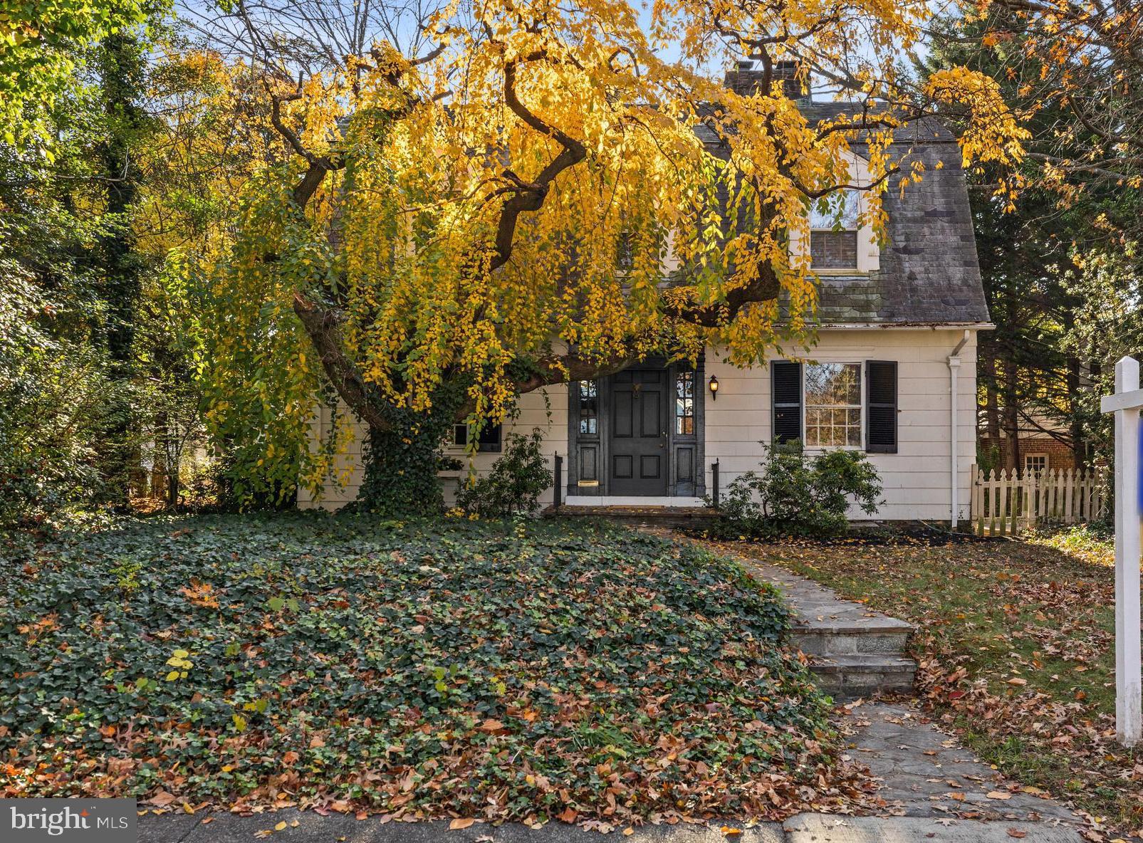 It has a stone path leading to the front door.