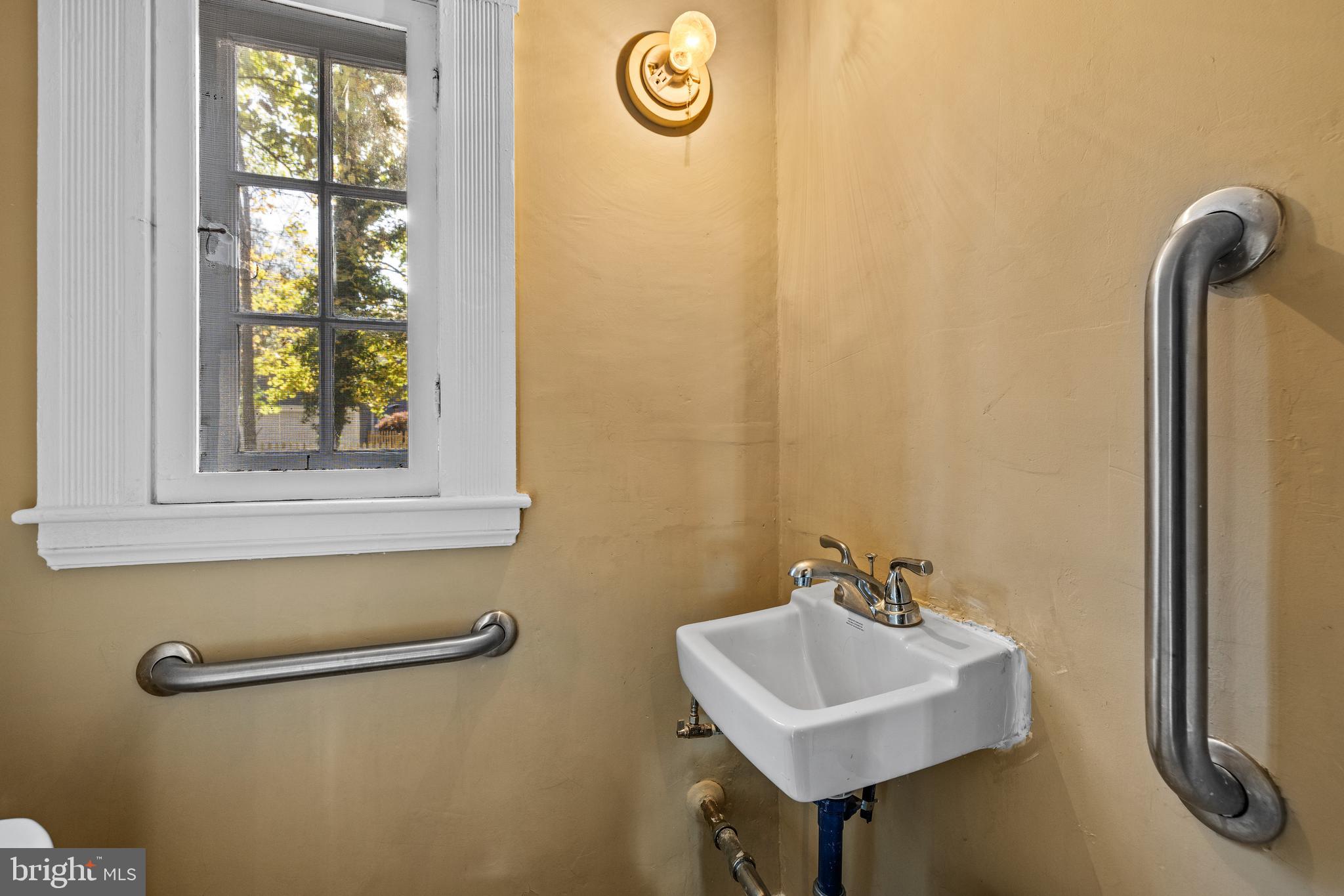 327 Broxton Road Baltimore, MD 21212 - Photo 17 of 47 There's a powder room on the main level.