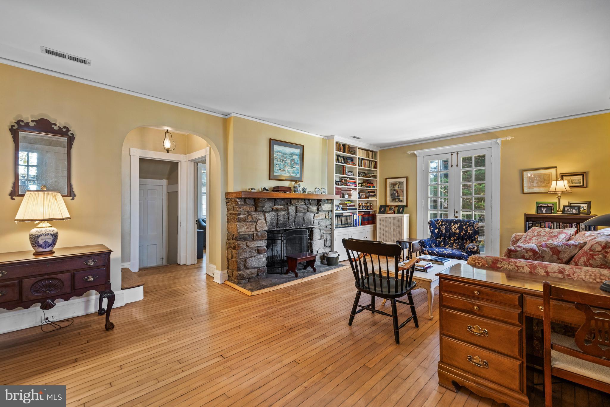 327 Broxton Road Baltimore, MD 21212 - Photo 5 of 47 The living room has an incredible stone fireplace.