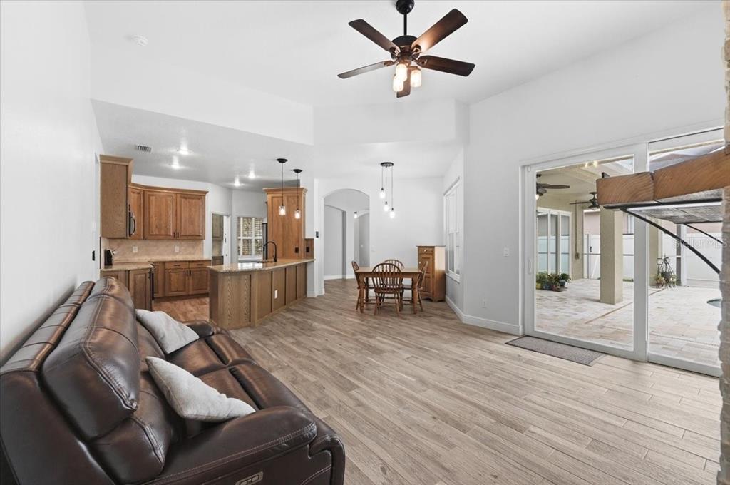 2214 Longmore Circle Valrico, FL 33596 - Photo 13 of 61 a living room with furniture and a wooden floor