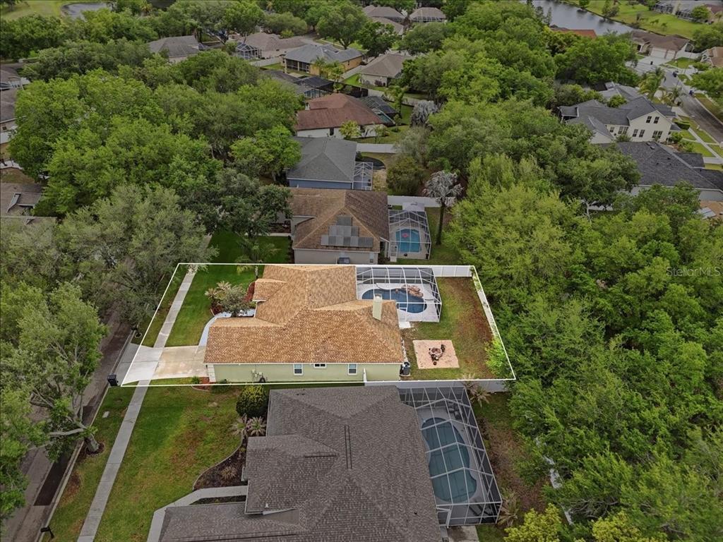 2214 Longmore Circle Valrico, FL 33596 - Photo 4 of 61 an aerial view of a house