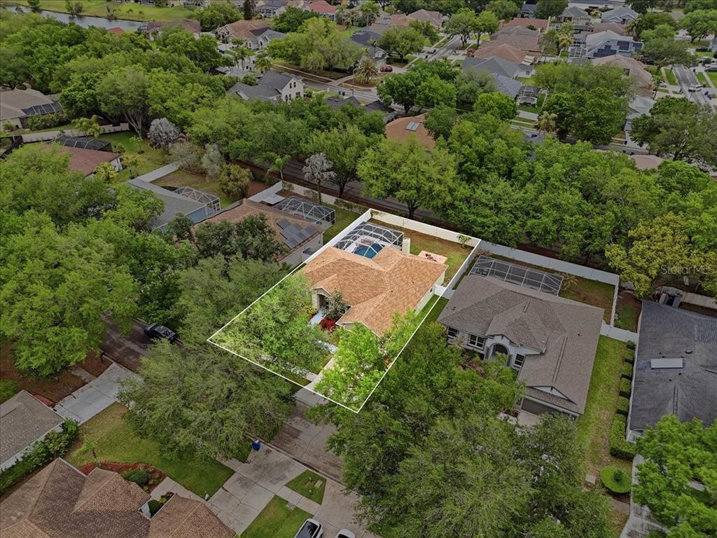 2214 Longmore Circle Valrico, FL 33596 - Photo 60 of 61 an aerial view of a house with a yard