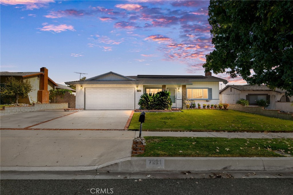 7221 Ramona Avenue Rancho Cucamonga, CA 91701 - Photo 1 of 30 a front view of a house with a garden