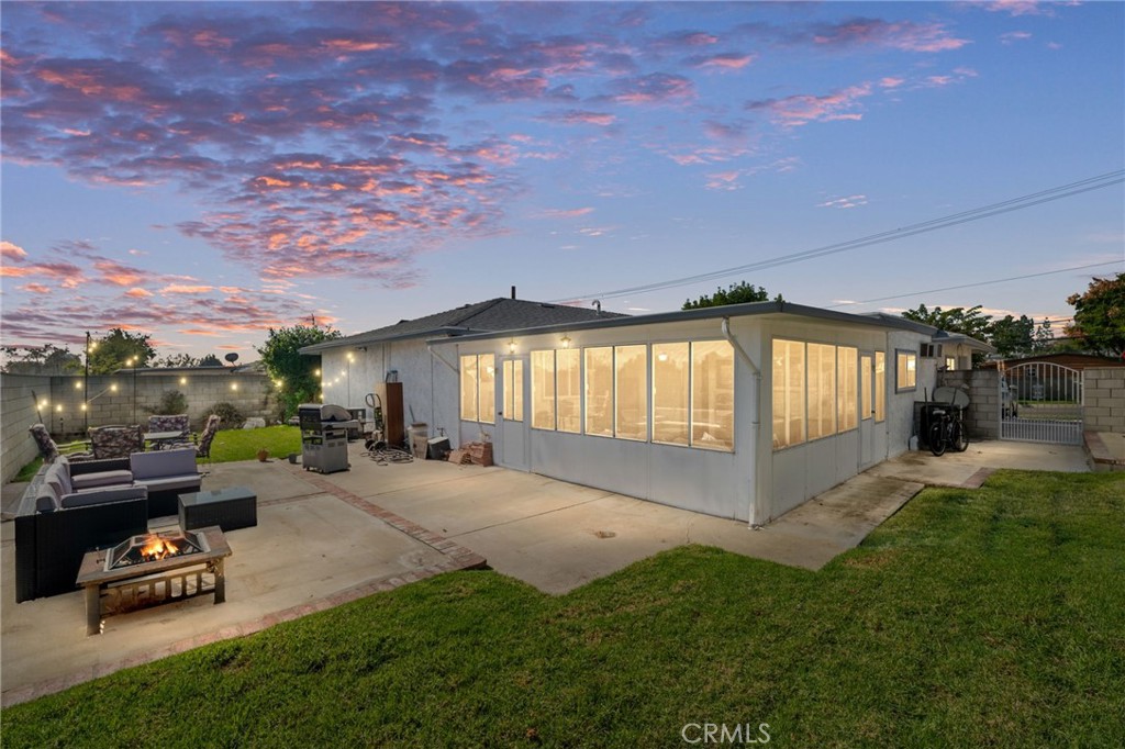7221 Ramona Avenue Rancho Cucamonga, CA 91701 - Photo 2 of 30 a view of a backyard with sitting area