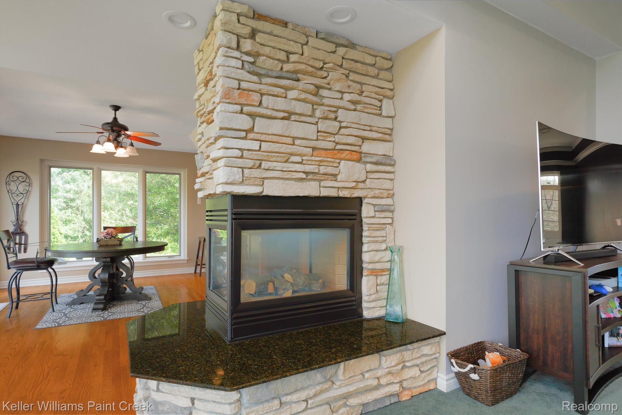 4912 Walker Road North Street, MI 48049 - Photo 26 of 71 Double sided fireplace