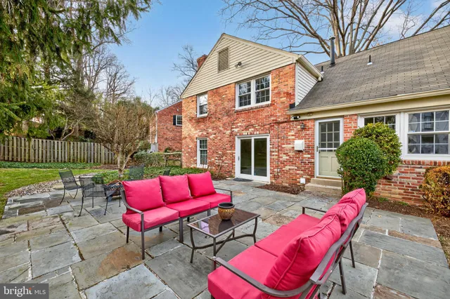 a building outdoor space with patio furniture