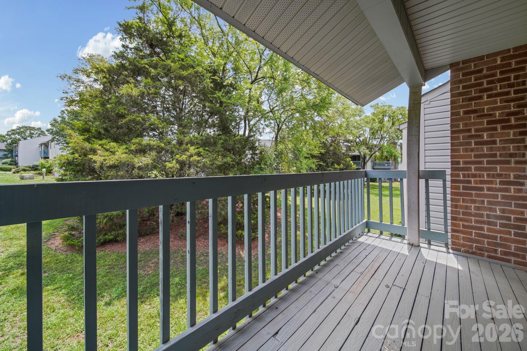 11023 Harrowfield Road Charlotte, NC 28226 - Photo 15 of 32 a view of a wooden deck