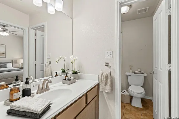 a bathroom with a toilet and a bathtub
