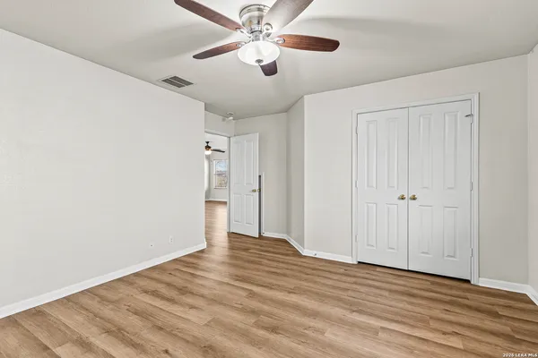 a view of a house with swimming pool and a yard