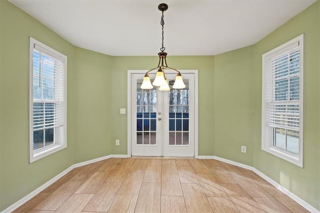1218 Morgans Run Monroe, GA 30656 - Photo 8 of 39 a view of an empty room with windows