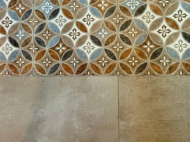 a bedroom with a large bed and a large window