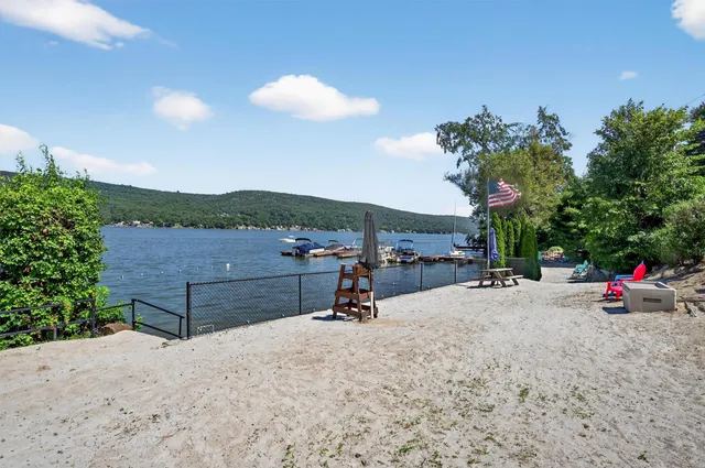 a park view with a bench in the patio