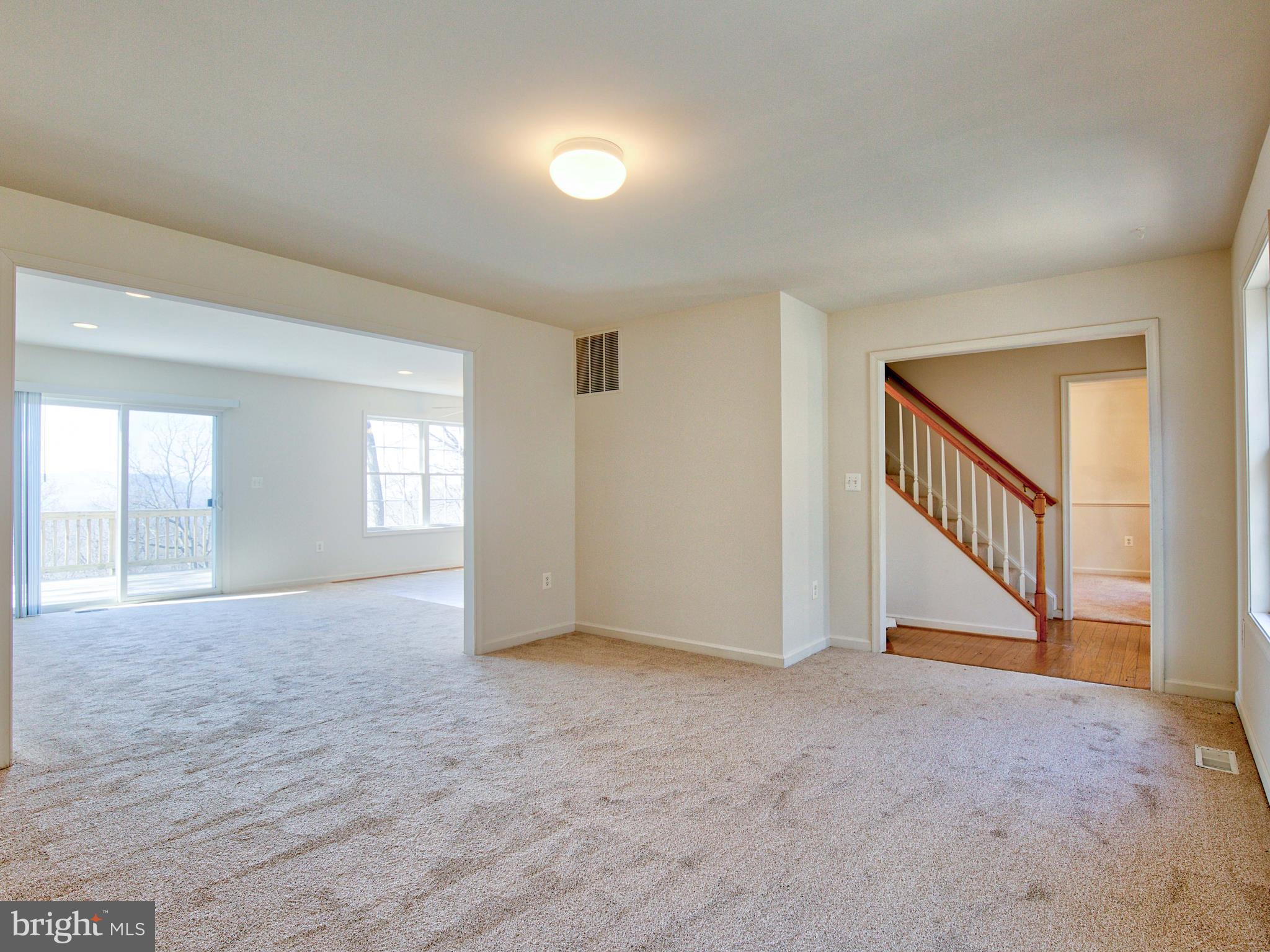 105 Bridle Path Road Front Royal, VA 22630 - Photo 21 of 45 Formal Living Room Looking into Family Room