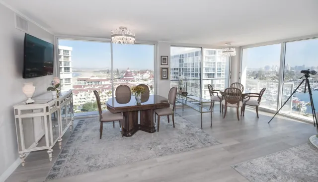 a view of a dining room with furniture window and outside view