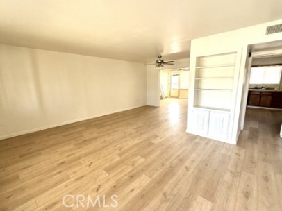 28811 Carmel Road Menifee, CA 92586 - Photo 3 of 14 wooden floor in an empty room