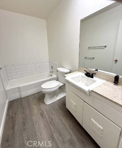 28811 Carmel Road Menifee, CA 92586 - Photo 9 of 14 a bathroom with a sink a toilet and shower