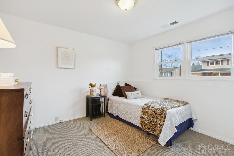 34 South Cliff Road Colonia, NJ 07067 - Photo 13 of 29 a room with a bed and a cabinets