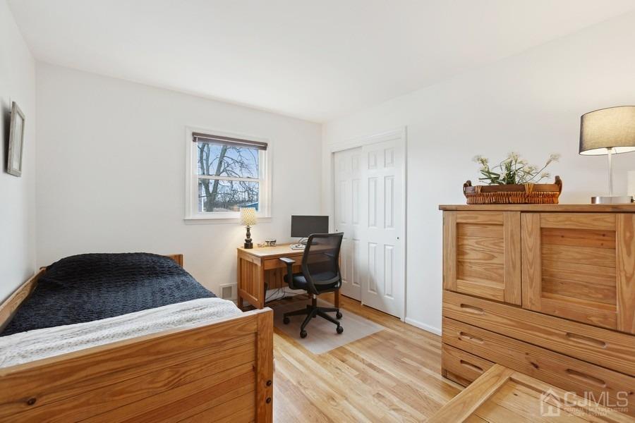 34 South Cliff Road Colonia, NJ 07067 - Photo 14 of 29 a living room with furniture and wooden floor