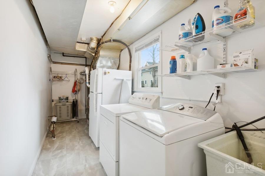 34 South Cliff Road Colonia, NJ 07067 - Photo 17 of 29 a utility room with dryer and washer