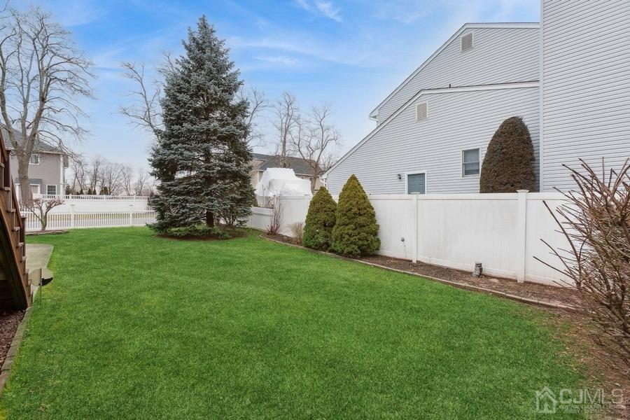 34 South Cliff Road Colonia, NJ 07067 - Photo 3 of 29 a view of a back yard of the house
