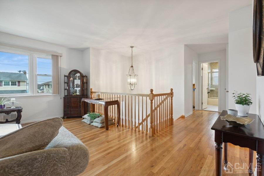 34 South Cliff Road Colonia, NJ 07067 - Photo 9 of 29 a living room with furniture windows and a wooden floor