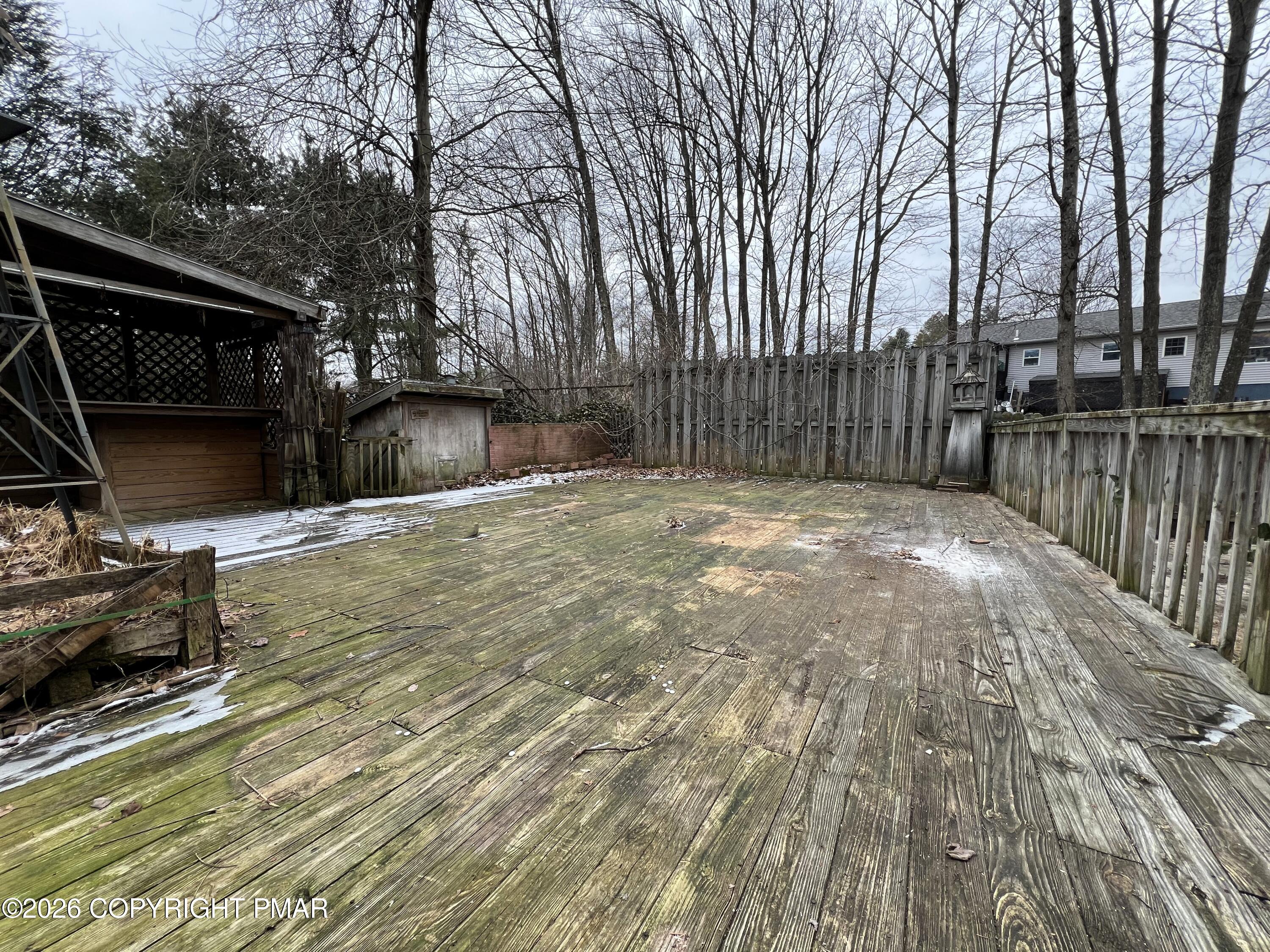152 Fairview Avenue Mount Pocono, PA 18344 - Photo 26 of 27 a swimming pool with wooden fence