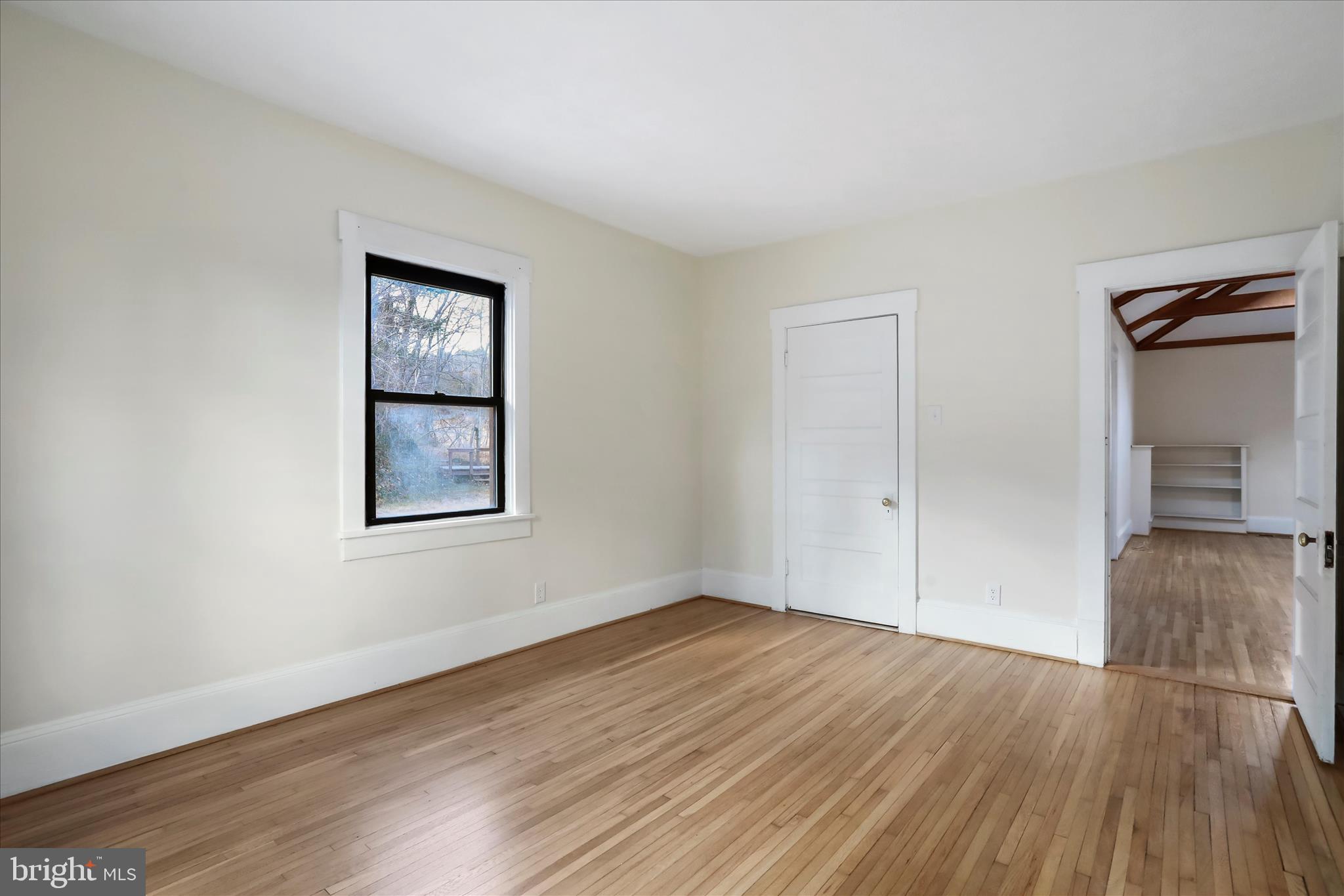 84 Funk Road Strasburg, VA 22657 - Photo 15 of 45 a view of a room with wooden floor and a window
