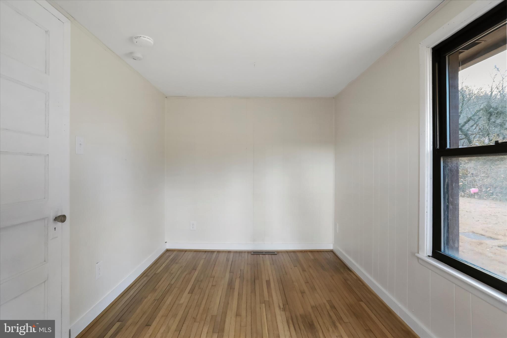 84 Funk Road Strasburg, VA 22657 - Photo 19 of 45 a view of a small space with wooden floor and a window