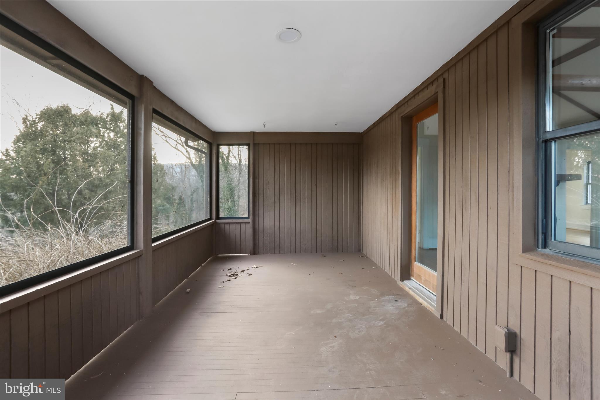 84 Funk Road Strasburg, VA 22657 - Photo 23 of 45 a view of an empty room with windows