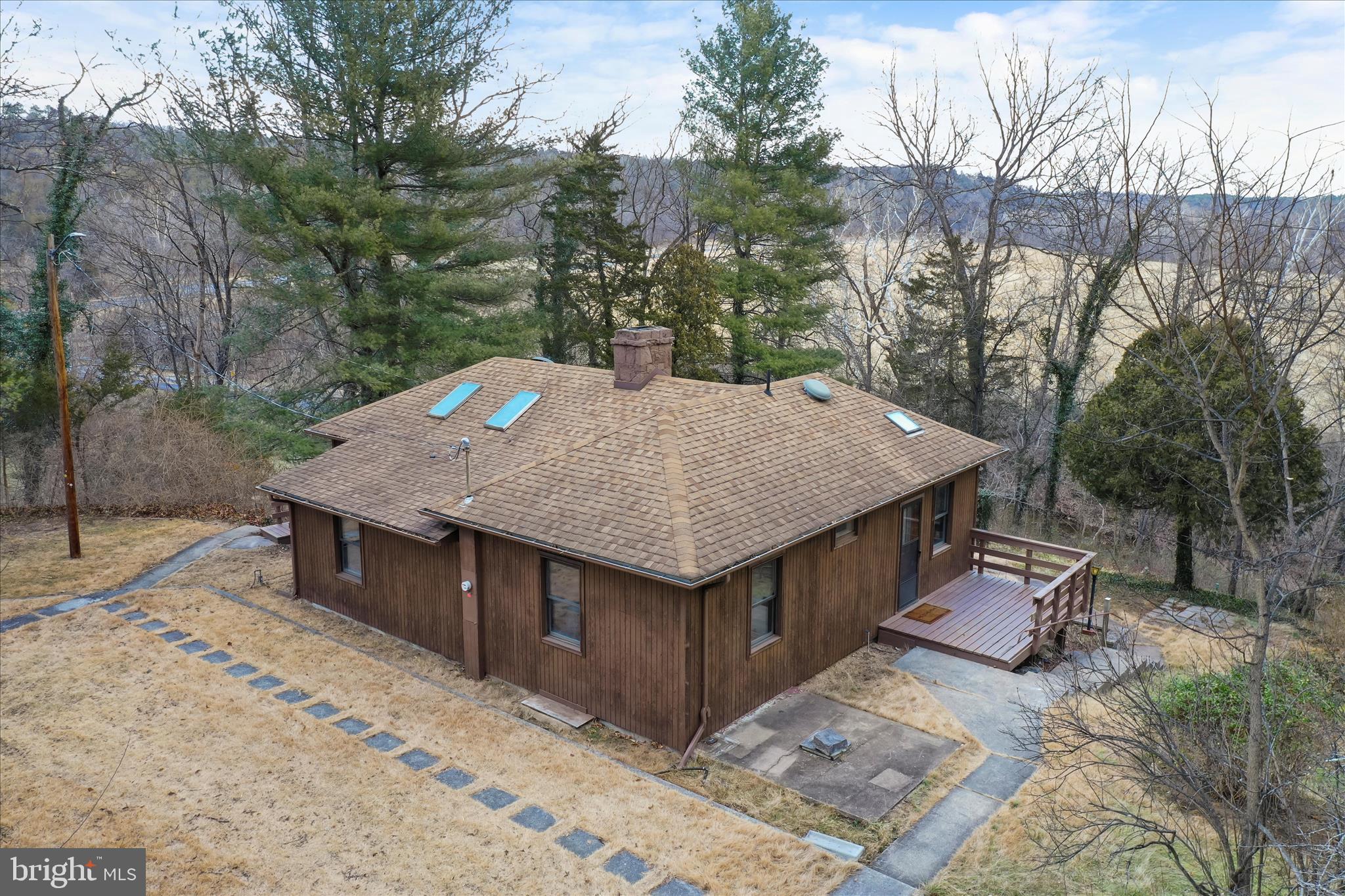 84 Funk Road Strasburg, VA 22657 - Photo 31 of 45 a roof deck with a table and chairs