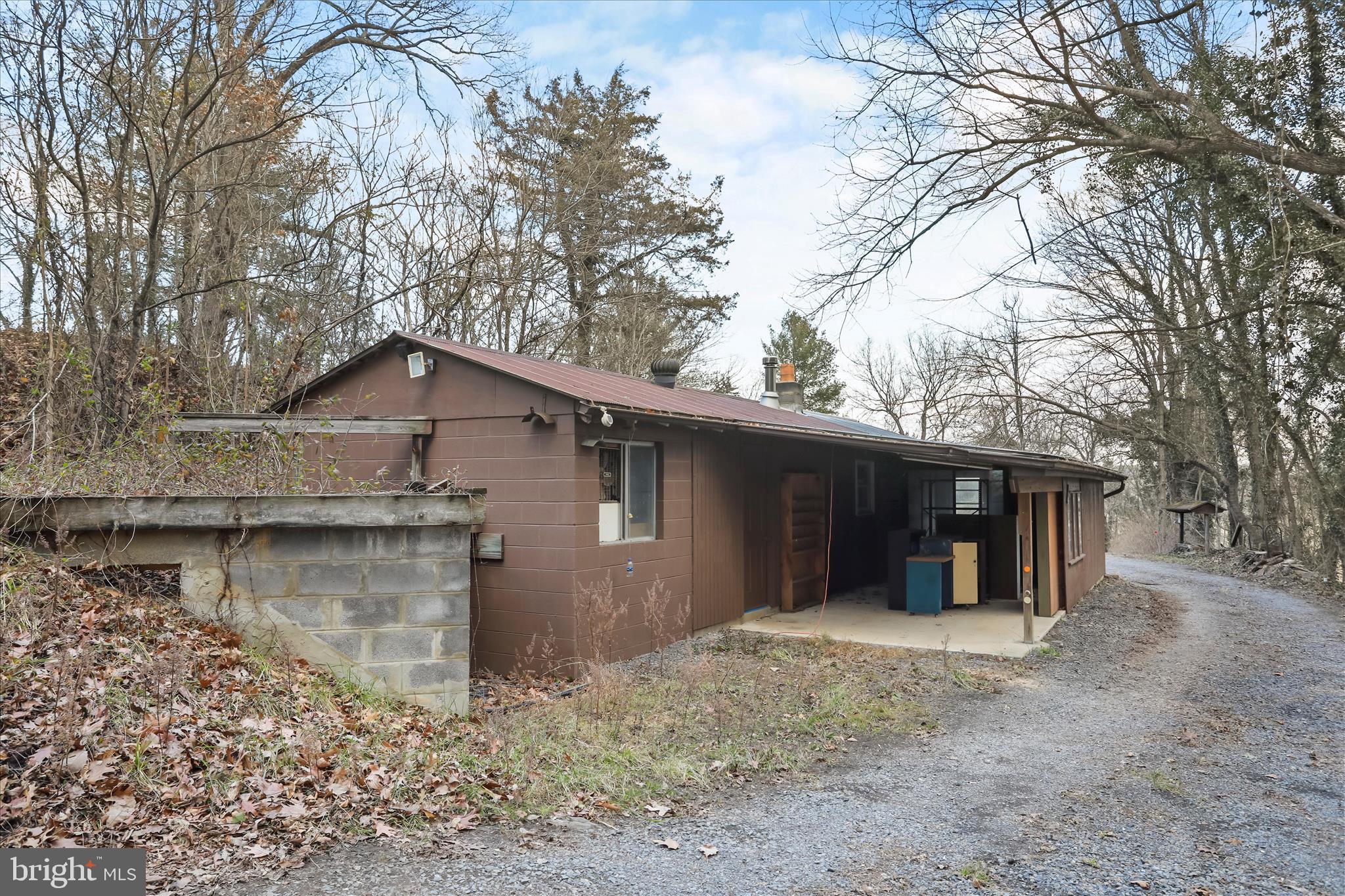 84 Funk Road Strasburg, VA 22657 - Photo 44 of 45 a view of a house with a yard and garage