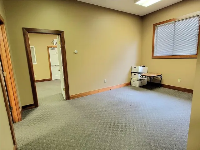 a view of a room with a door