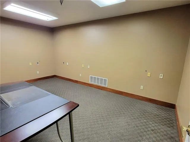 an empty room with a workbench