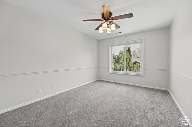 10664 Trail Ridge Circle Sandy, UT 84092 - Photo 33 of 113 Gray carpet flooring, white walls, and a multi-light ceiling fan