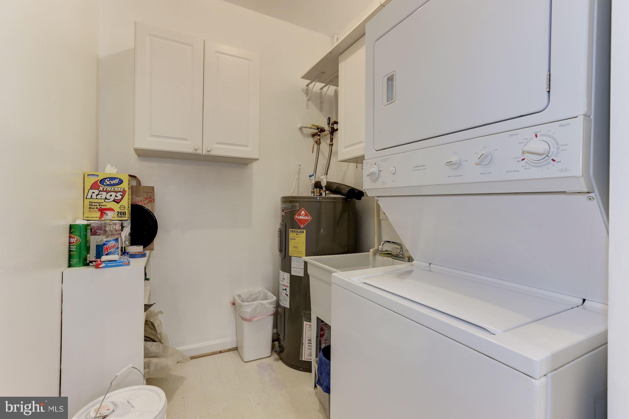 4330 Cannon Ridge Court, Unit 21 Fairfax, VA 22033 - Photo 14 of 24 a utility room with dryer and washer