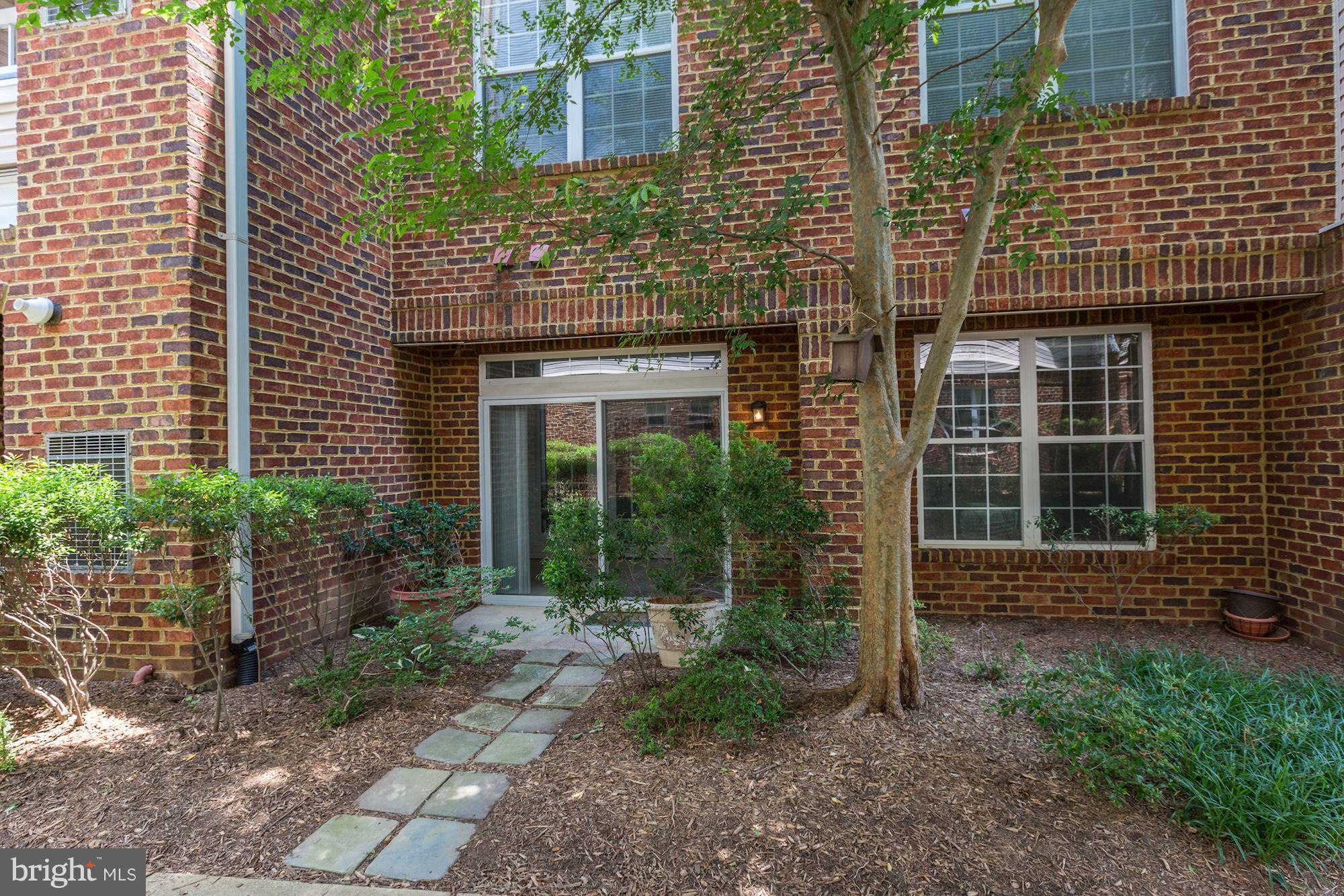 4330 Cannon Ridge Court, Unit 21 Fairfax, VA 22033 - Photo 15 of 24 a view of entrance of the house and garden