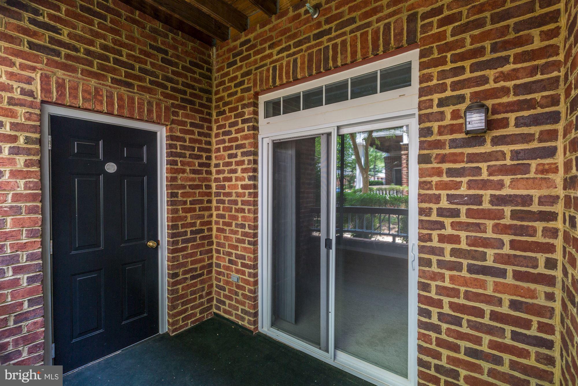 4330 Cannon Ridge Court, Unit 21 Fairfax, VA 22033 - Photo 16 of 24 a view of a brick house with front door