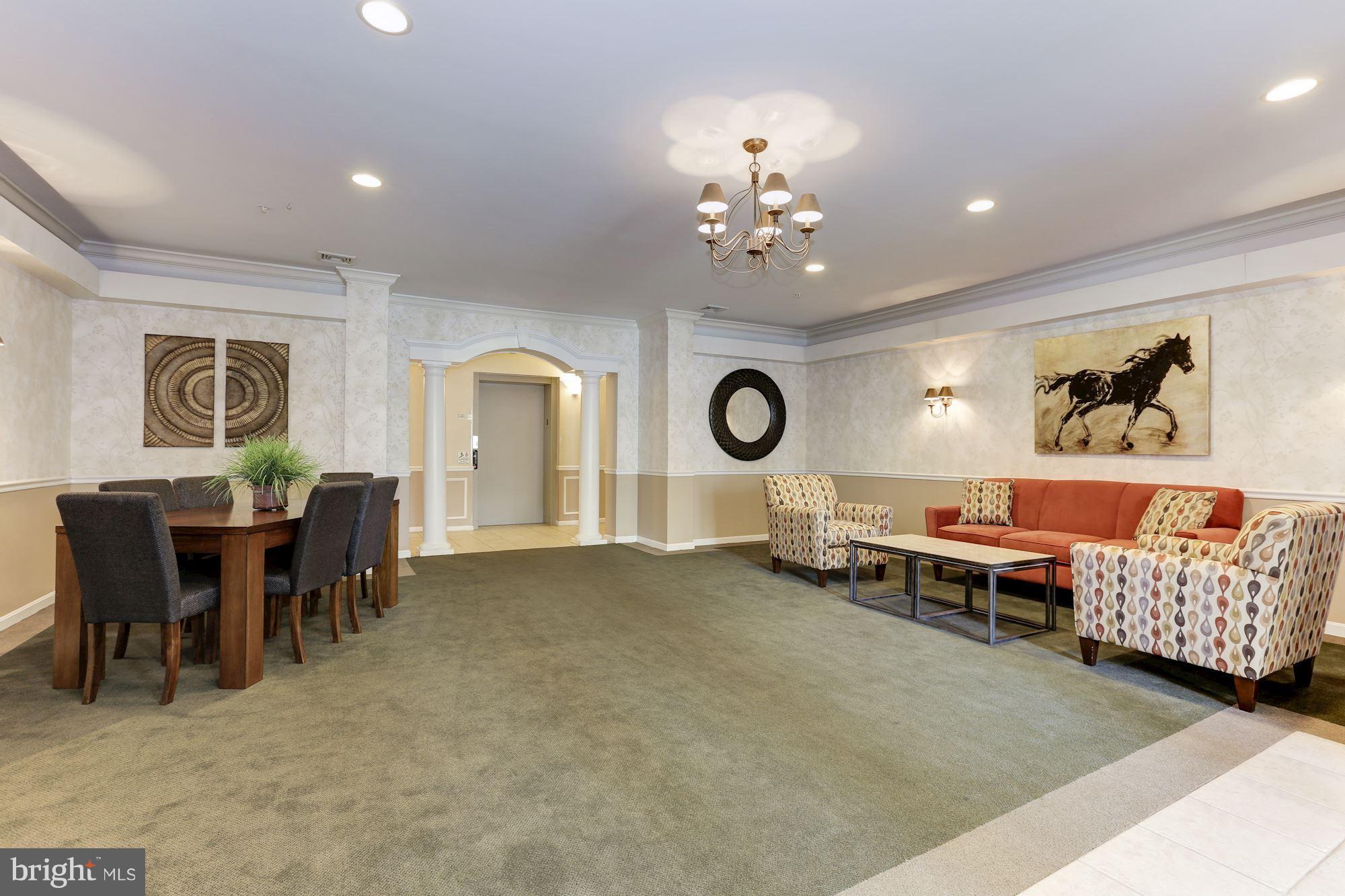 4330 Cannon Ridge Court, Unit 21 Fairfax, VA 22033 - Photo 19 of 24 a living room with furniture and a large window