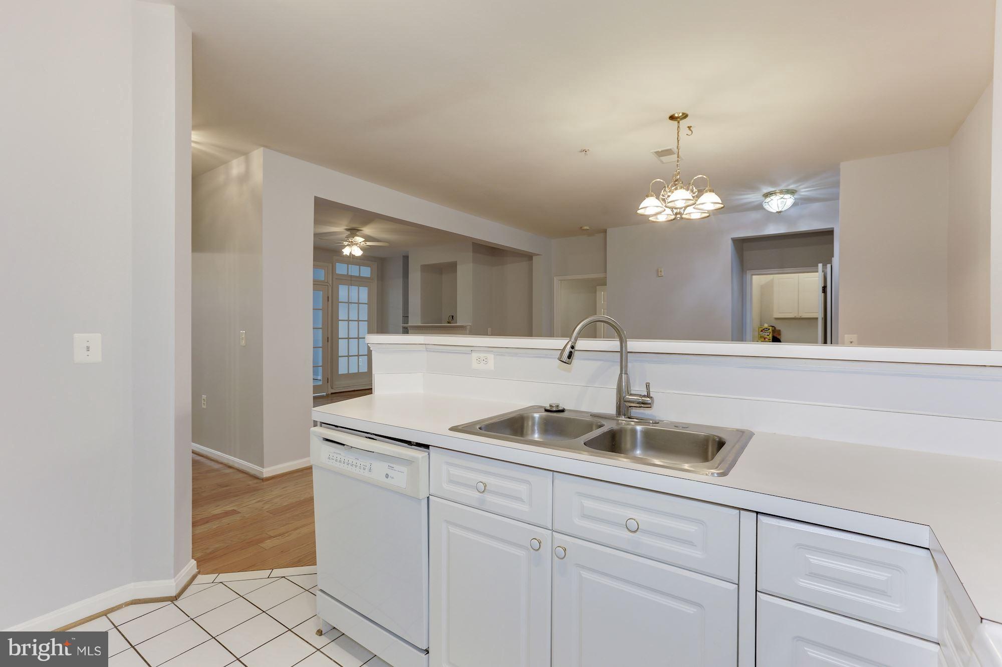 4330 Cannon Ridge Court, Unit 21 Fairfax, VA 22033 - Photo 5 of 24 a bathroom with a sink and a mirror