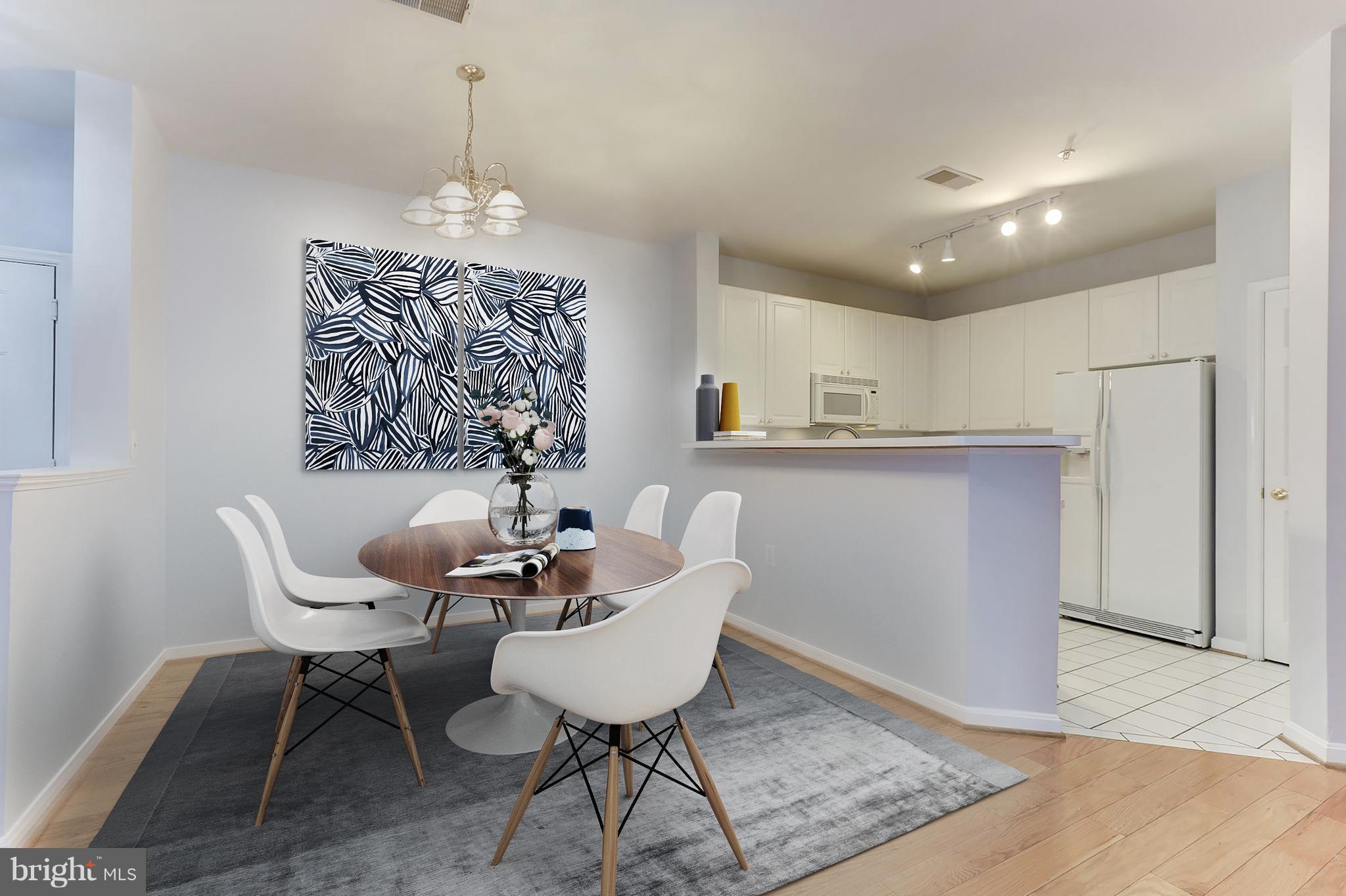 4330 Cannon Ridge Court, Unit 21 Fairfax, VA 22033 - Photo 6 of 24 a dining room with furniture and window