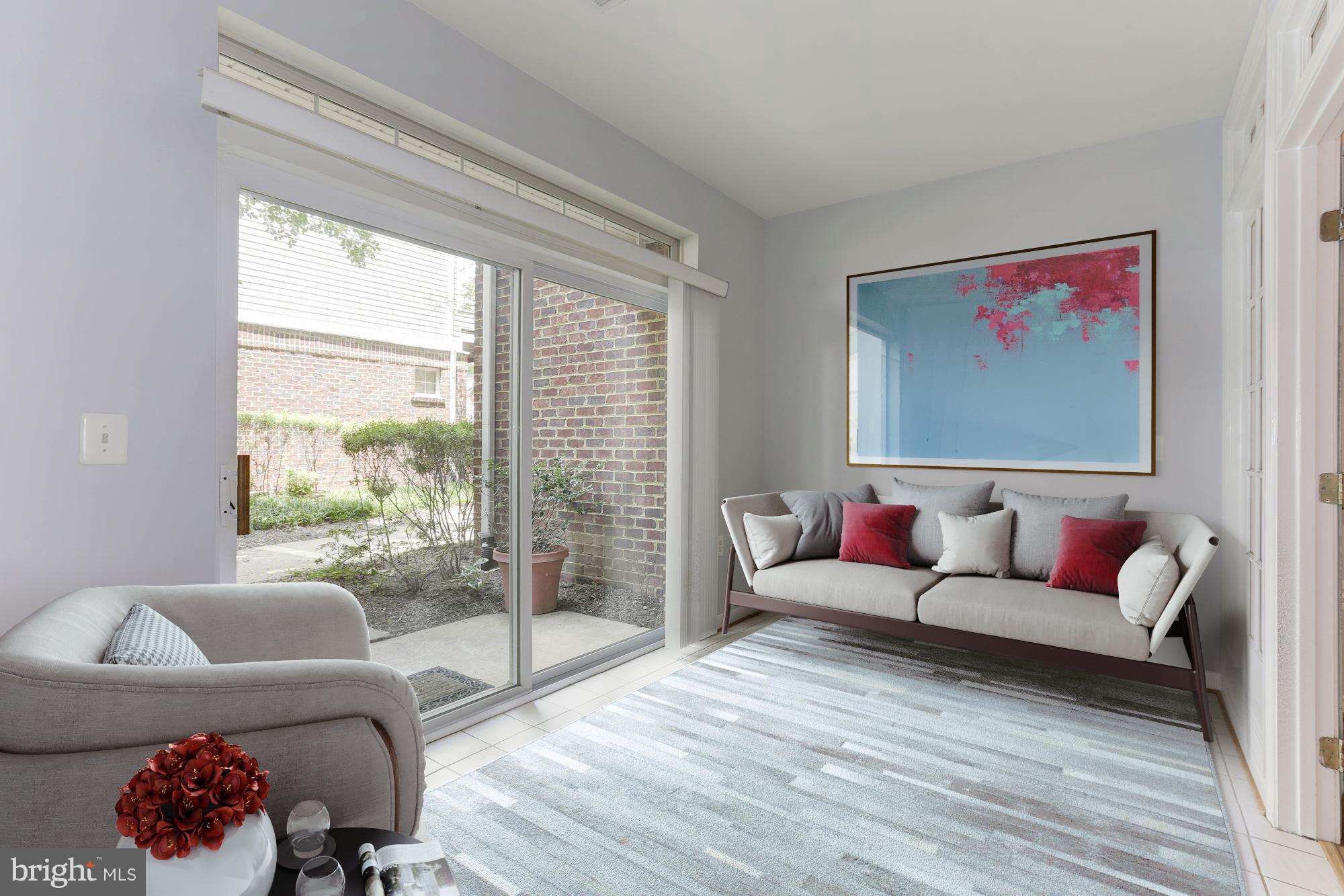 4330 Cannon Ridge Court, Unit 21 Fairfax, VA 22033 - Photo 7 of 24 a living room with furniture and a large window