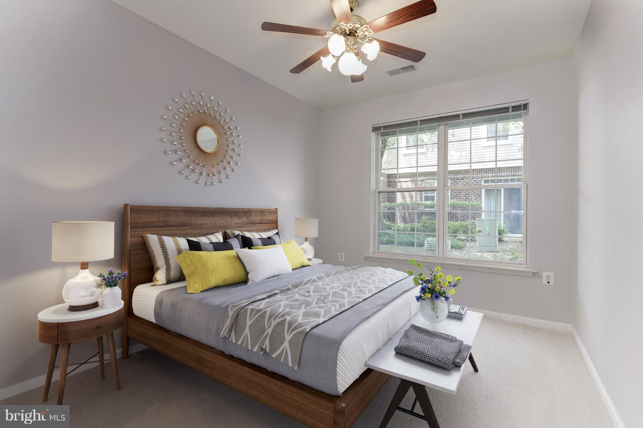 4330 Cannon Ridge Court, Unit 21 Fairfax, VA 22033 - Photo 10 of 24 a bedroom with a bed and a window
